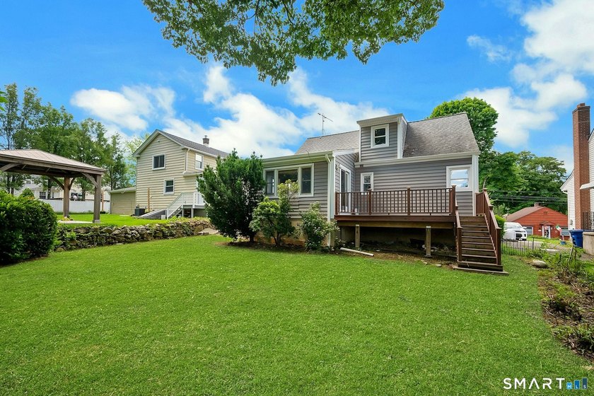 Beautifully updated and deceptively spacious, this move-in ready - photo 29
