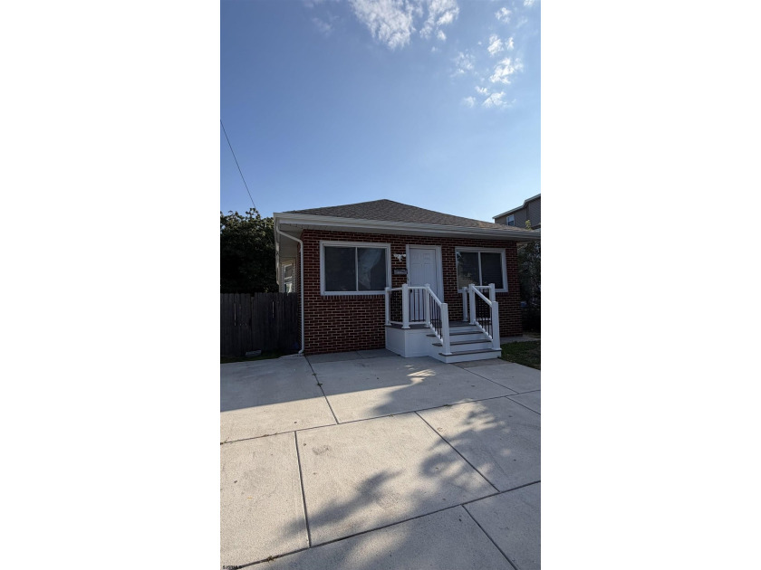 Completely renovated and move-in ready! This beautifully updated - photo 3