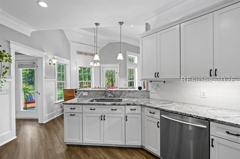 On a generous 0.63-acre corner lot in golf cart-friendly - photo 13
