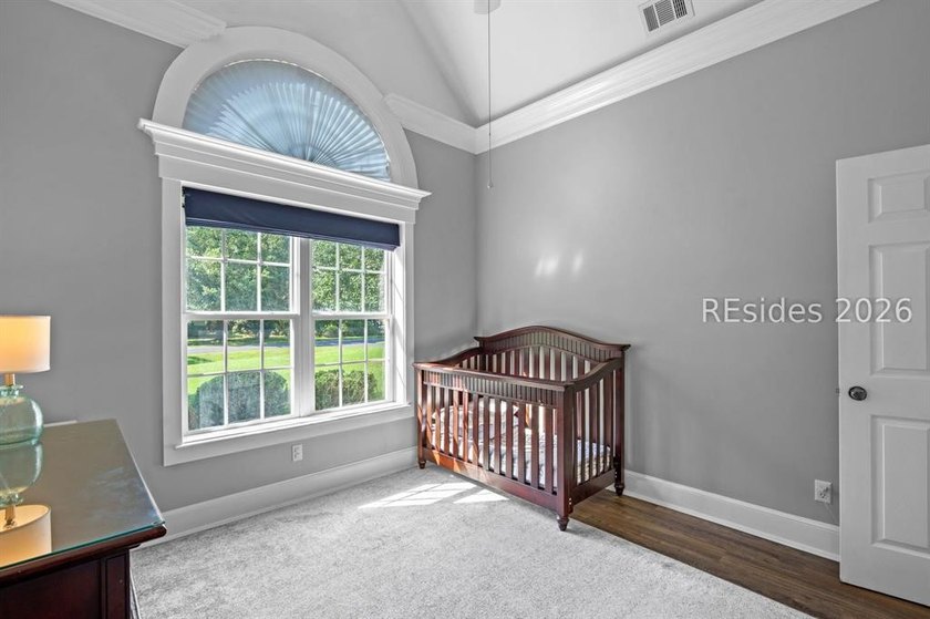 On a generous 0.63-acre corner lot in golf cart-friendly - photo 32