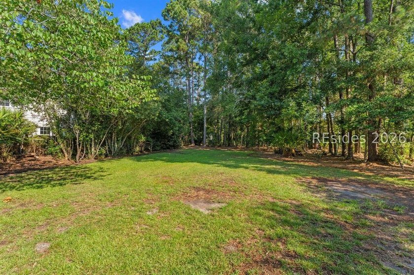 On a generous 0.63-acre corner lot in golf cart-friendly - photo 50