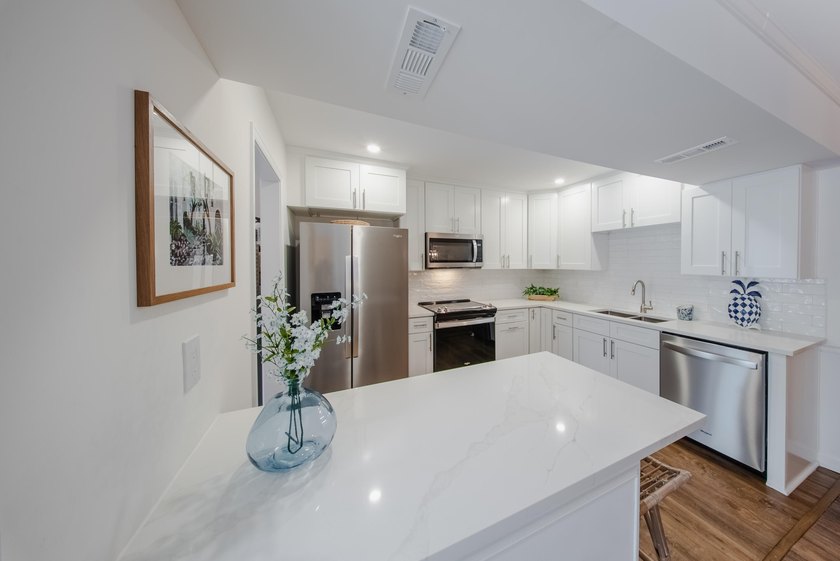 Welcome to your dream home nestled amidst breathtaking golf - photo 4