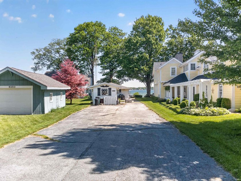 The value is in the setting-53 feet of Lake Wawasee frontage, a - photo 15