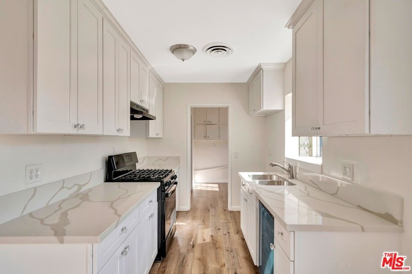 This charming single-story home blends mid-century character - photo 14