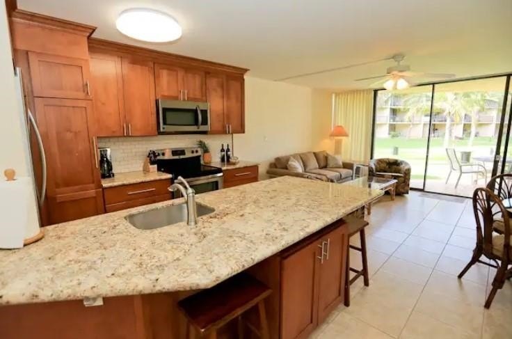 This beautifully updated 1 bedroom, 2 bathroom condo is ground - photo 2