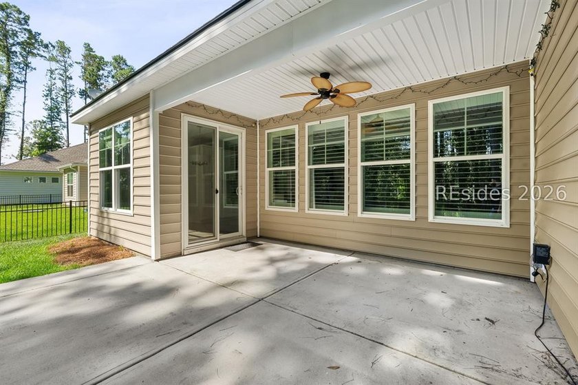 Tucked away on a private, wooded lot, this stunning single-story - photo 5
