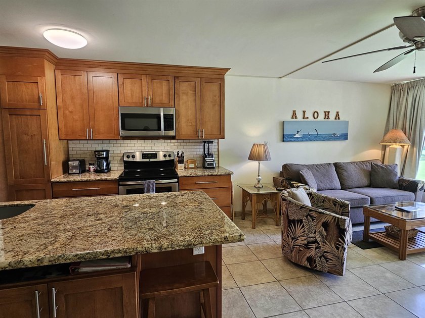 This beautifully updated 1 bedroom, 2 bathroom condo is ground - photo 6