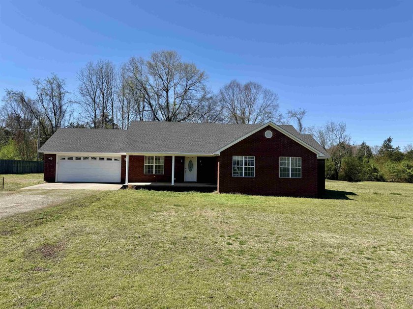Contemporary brick home located near Lake Ludwig and the Red - photo 3