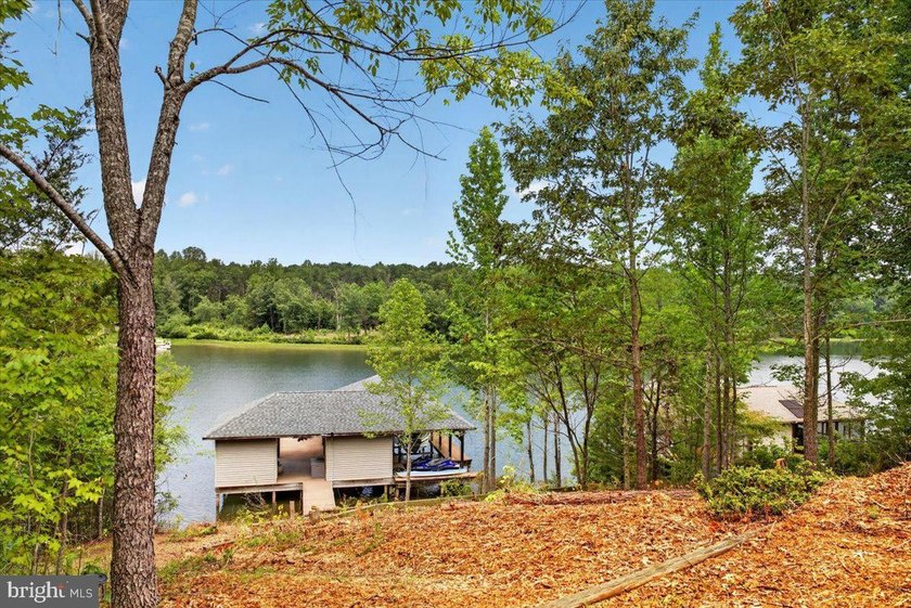 Remarkable waterfront lot! 3 stall Boathouse with huge sunning - photo 6