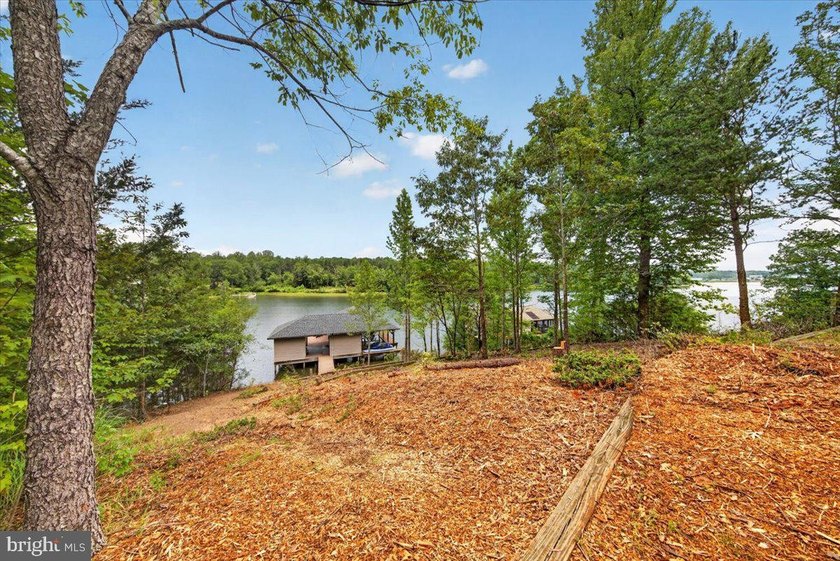 Remarkable waterfront lot! 3 stall Boathouse with huge sunning - photo 8