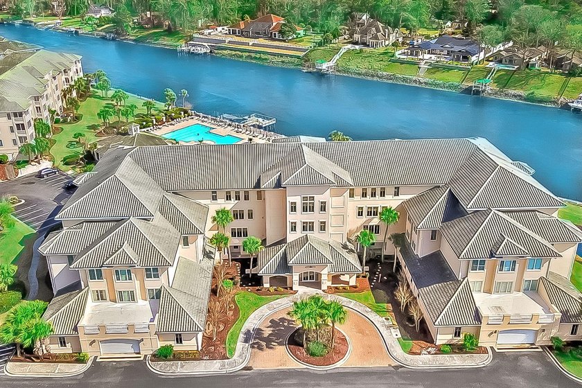 Welcome to Edgewater 513, a rare ground-floor ICW condo located - photo 2
