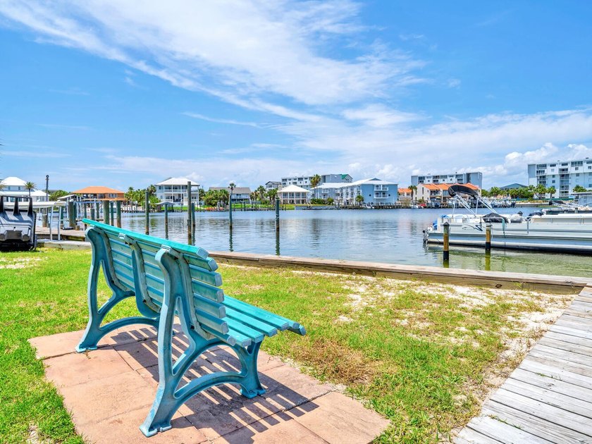 Watch the boats drift by and soak in the vibrant energy of - photo 24