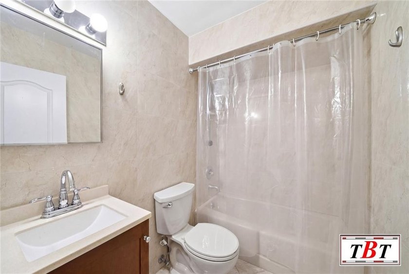 Welcome to 1555 East 13th Street! This colossal, impeccably - photo 17