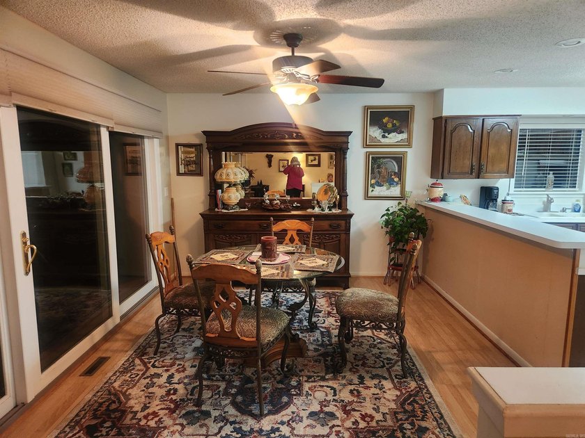 Welcome home to this three bedroom one and half bath home - photo 4
