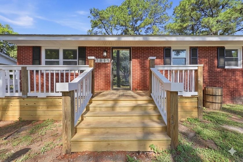 Welcome home to this beautifully remodeled 3-bedroom, 2 - photo 3