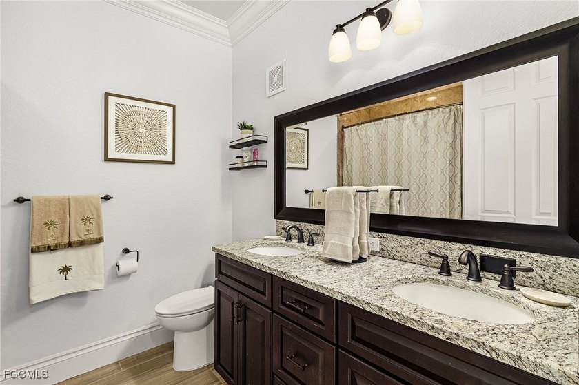 Price Improved! Luxury lakefront living meets breathtaking golf - photo 14
