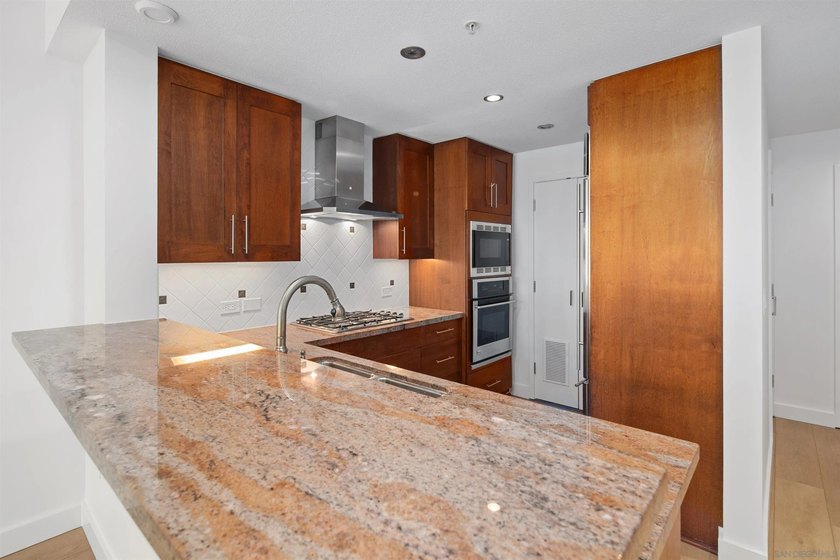 Step into unparalleled luxury with this beautifully upgraded - photo 7