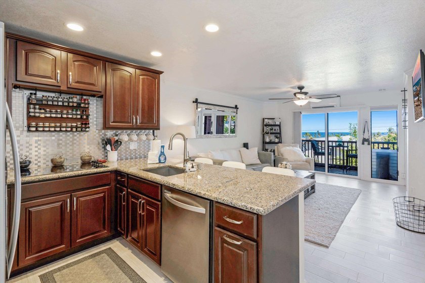 Welcome to Koa Kai 6B, a beautifully updated 2-bedroom, 2-bath - photo 3