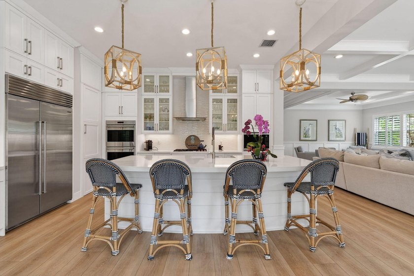 Set on a private half-acre homesite within the gated community - photo 11