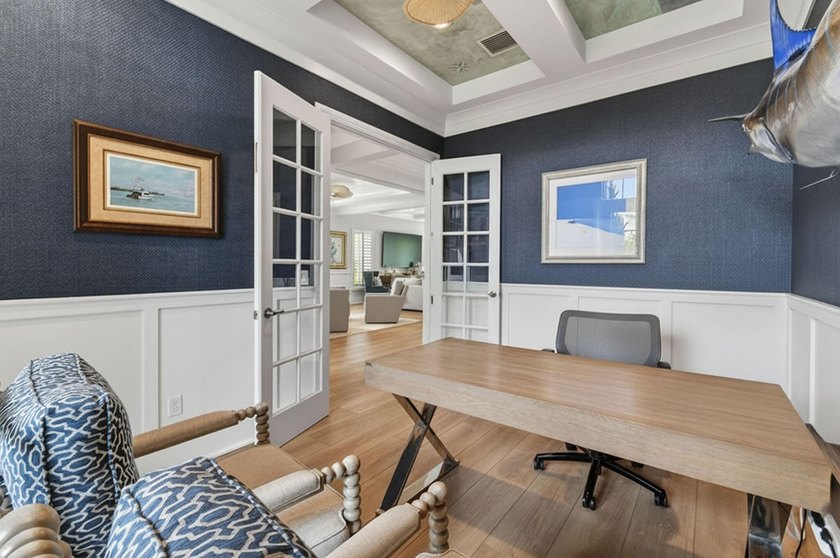 Set on a private half-acre homesite within the gated community - photo 27