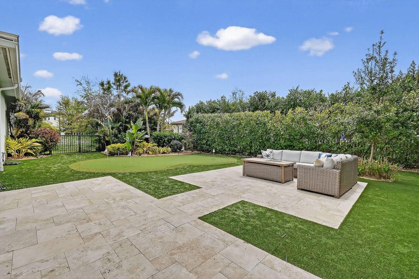 Set on a private half-acre homesite within the gated community - photo 49