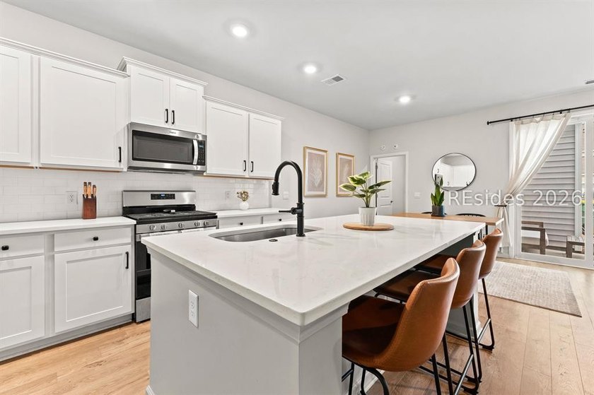 Experience the best of Lowcountry living with modern upgrades at - photo 5