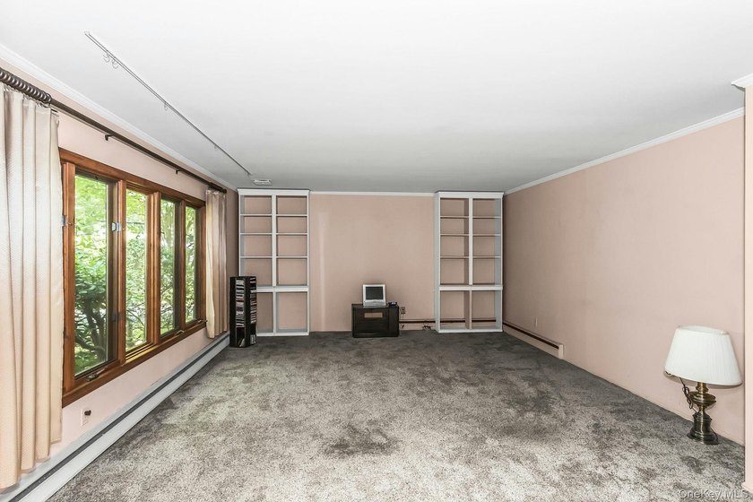 Ranch with 3 bedrooms and two full baths set on a 1/2 acre of - photo 4