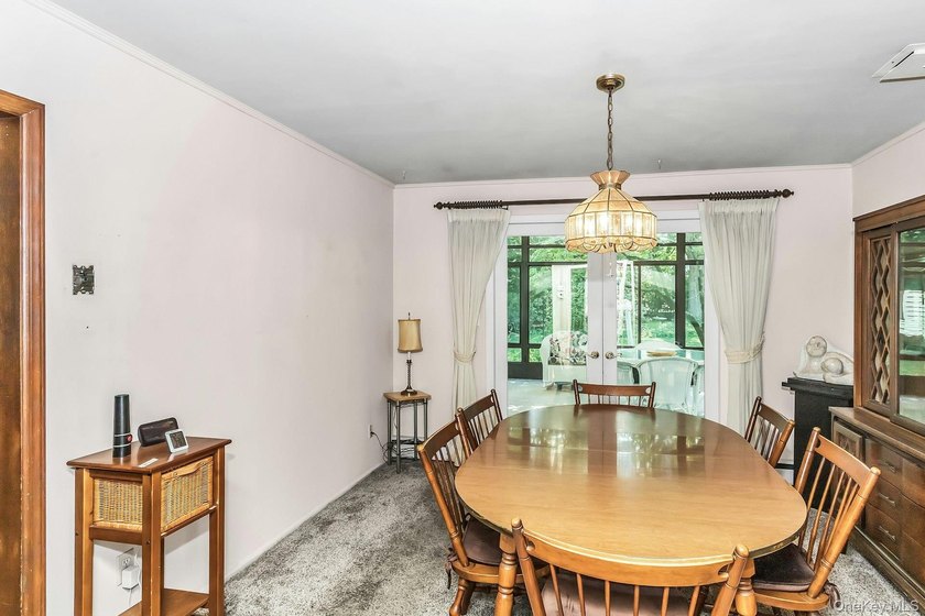 Ranch with 3 bedrooms and two full baths set on a 1/2 acre of - photo 7