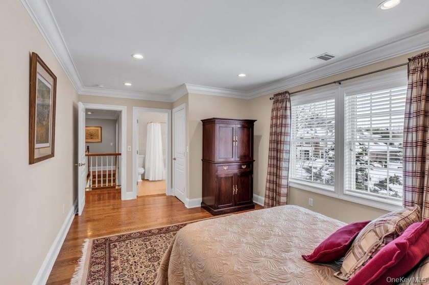 This Flower Hill Center Hall Colonial spans 3,600 square feet - photo 25