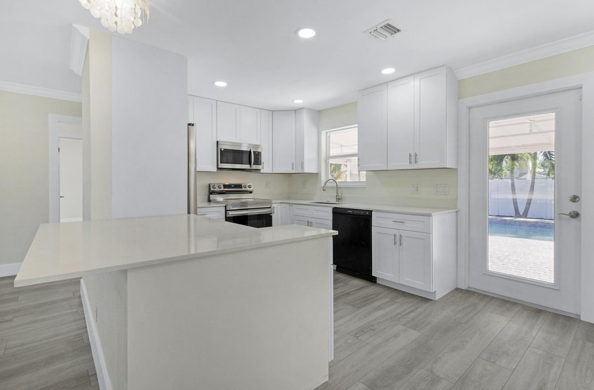 Completely updated and move-in ready, this 3-bedroom, 2-bath - photo 12