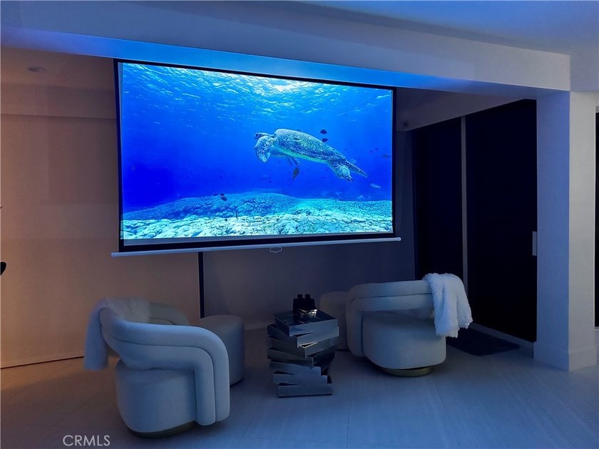Escape to an exquisite, fully furnished oceanfront retreat that - photo 11