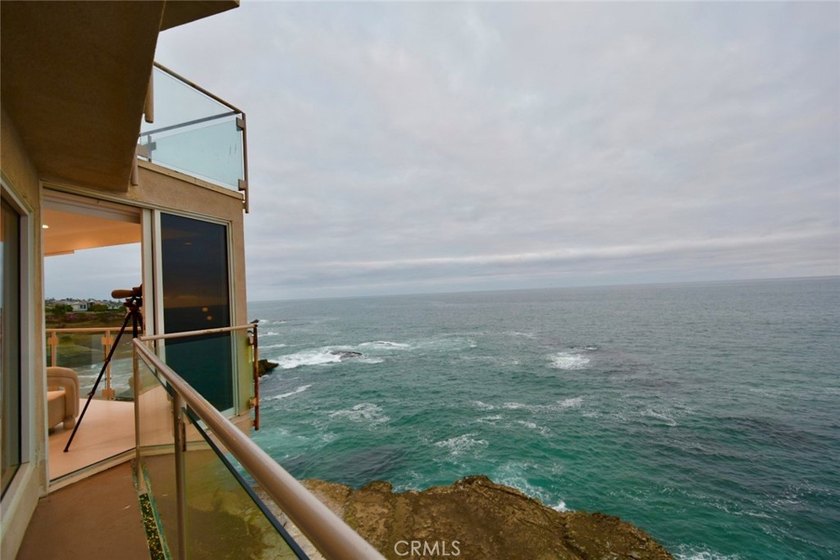 Escape to an exquisite, fully furnished oceanfront retreat that - photo 13