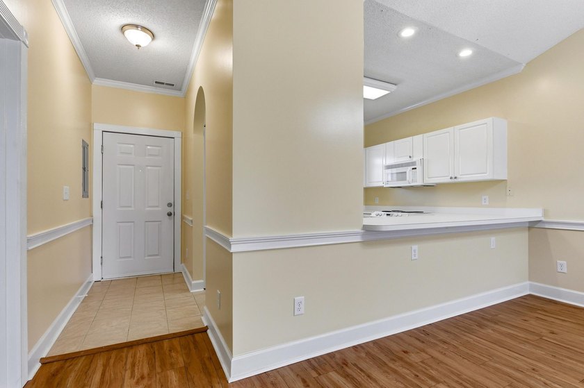 Located in the desirable Magnolia Place community in the heart - photo 3