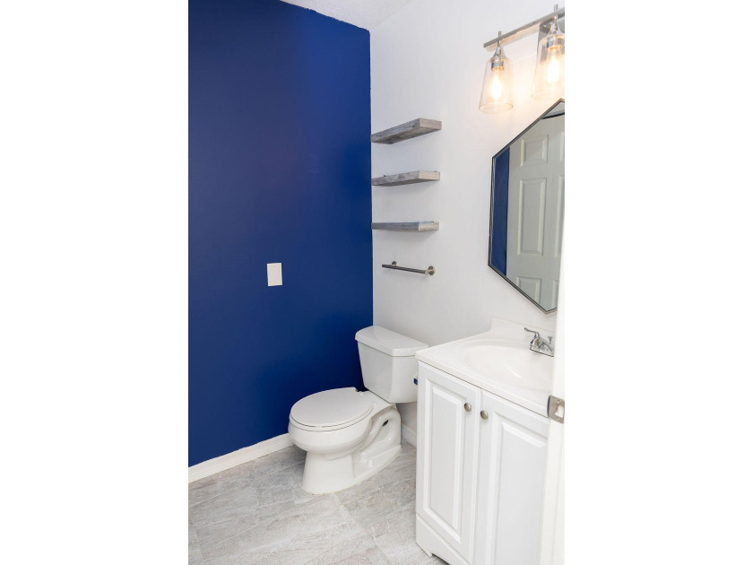 This charming home features updated kitchen and bathrooms with - photo 13