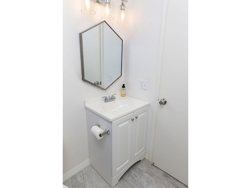 This charming home features updated kitchen and bathrooms with - photo 15