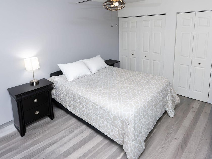 This charming home features updated kitchen and bathrooms with - photo 22