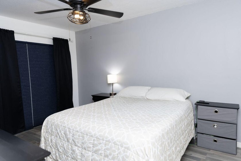 This charming home features updated kitchen and bathrooms with - photo 23