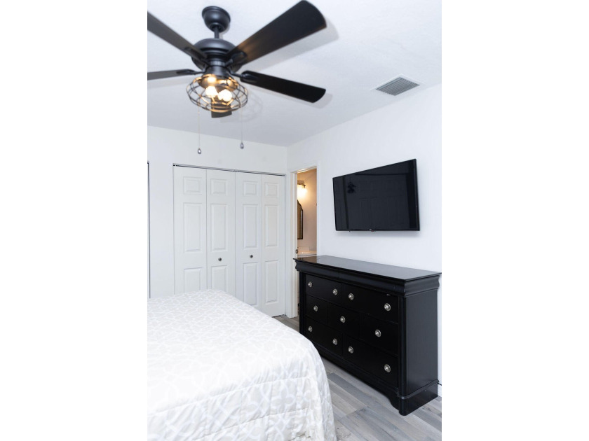 This charming home features updated kitchen and bathrooms with - photo 25