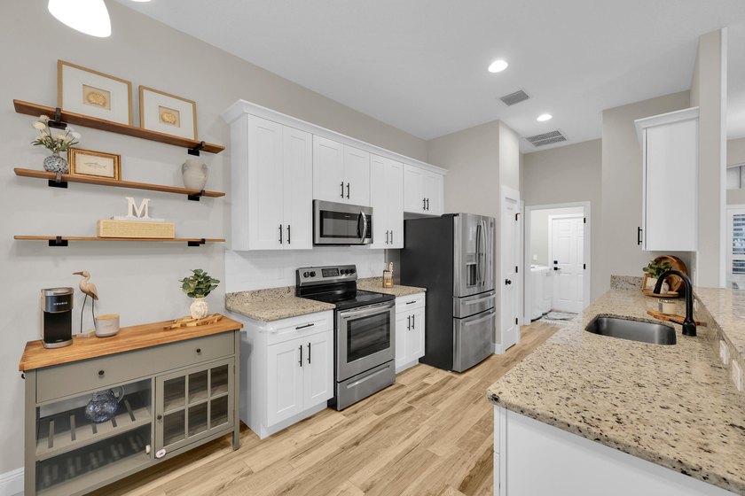 Welcome home to this beautifully maintained 3-bedroom - photo 16
