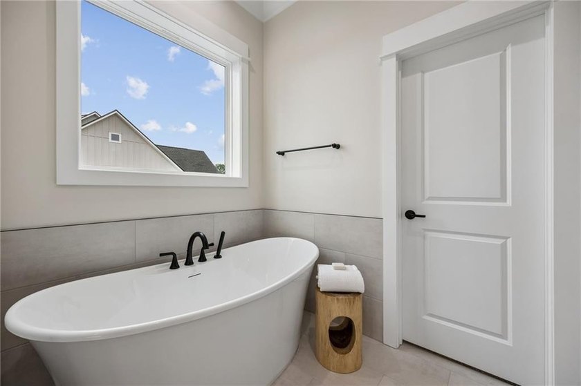 NEWLY COMPLETED AND BEAUTIFULLY DESIGNED, THIS 4-BEDROOM, 3-BATH - photo 33