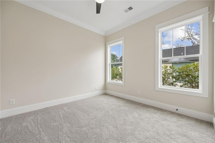 NEWLY COMPLETED AND BEAUTIFULLY DESIGNED, THIS 4-BEDROOM, 3-BATH - photo 38