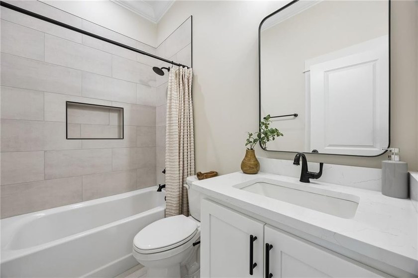 NEWLY COMPLETED AND BEAUTIFULLY DESIGNED, THIS 4-BEDROOM, 3-BATH - photo 42