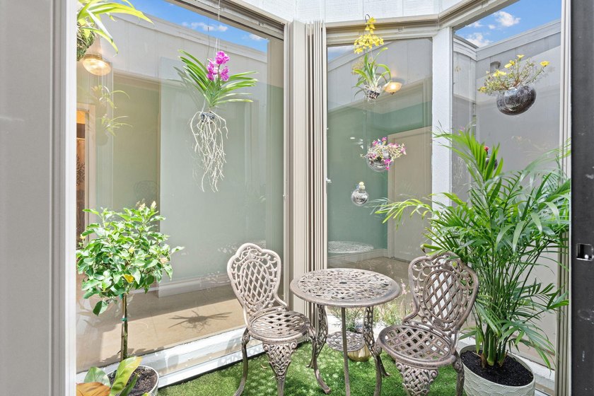 Welcome home to this spacious 3-bed, 2-bath corner Villa in a - photo 12