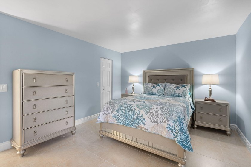 Welcome home to this spacious 3-bed, 2-bath corner Villa in a - photo 13