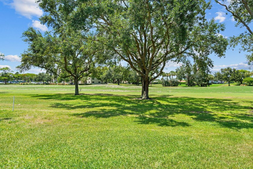 Welcome home to this spacious 3-bed, 2-bath corner Villa in a - photo 36