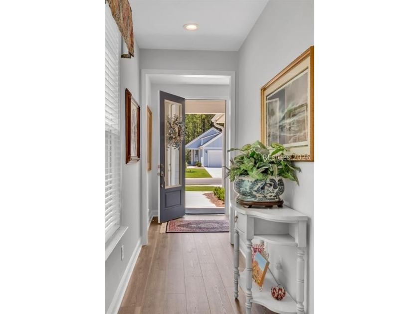 Nestled on a premium lot with a beautiful, serene lagoon view - photo 3