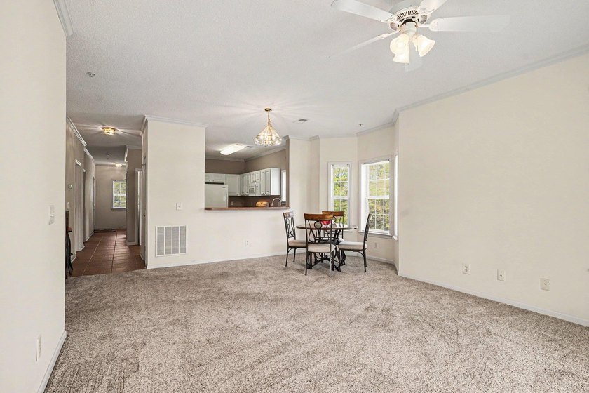 Enjoy beautiful golf course views from this bright and spacious - photo 3