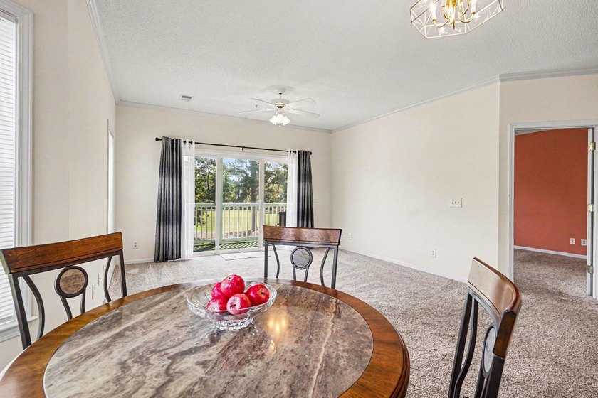 Enjoy beautiful golf course views from this bright and spacious - photo 4