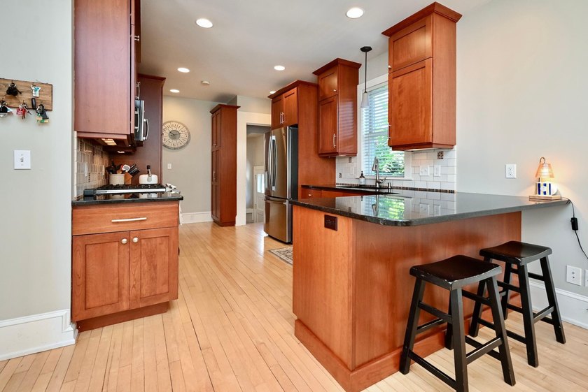 Welcome to this beautifully maintained 2.5-story home in a - photo 12