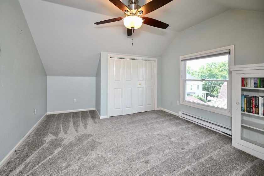 Welcome to this beautifully maintained 2.5-story home in a - photo 27